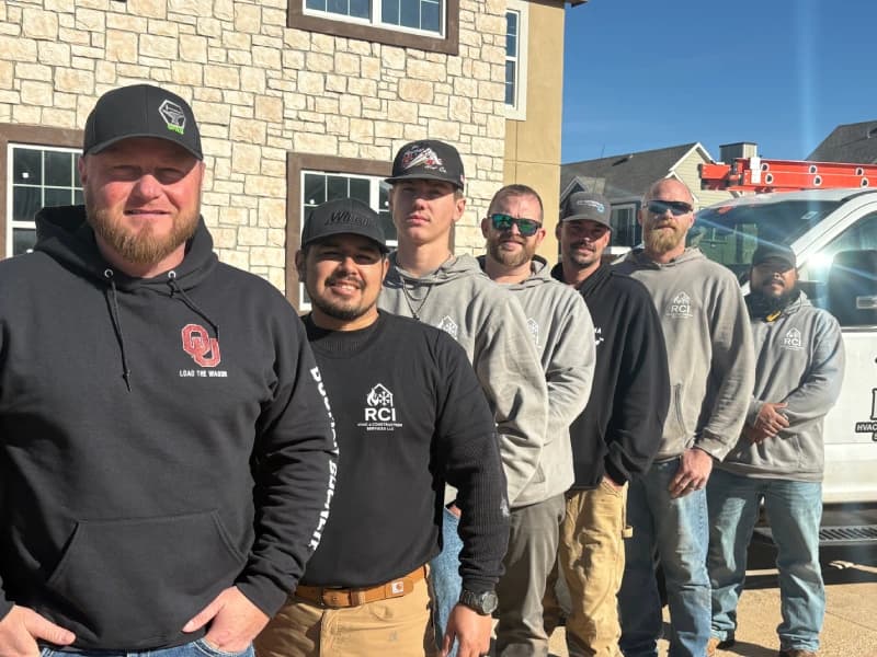 The RCI HVAC & Construction Services team in front of their shop